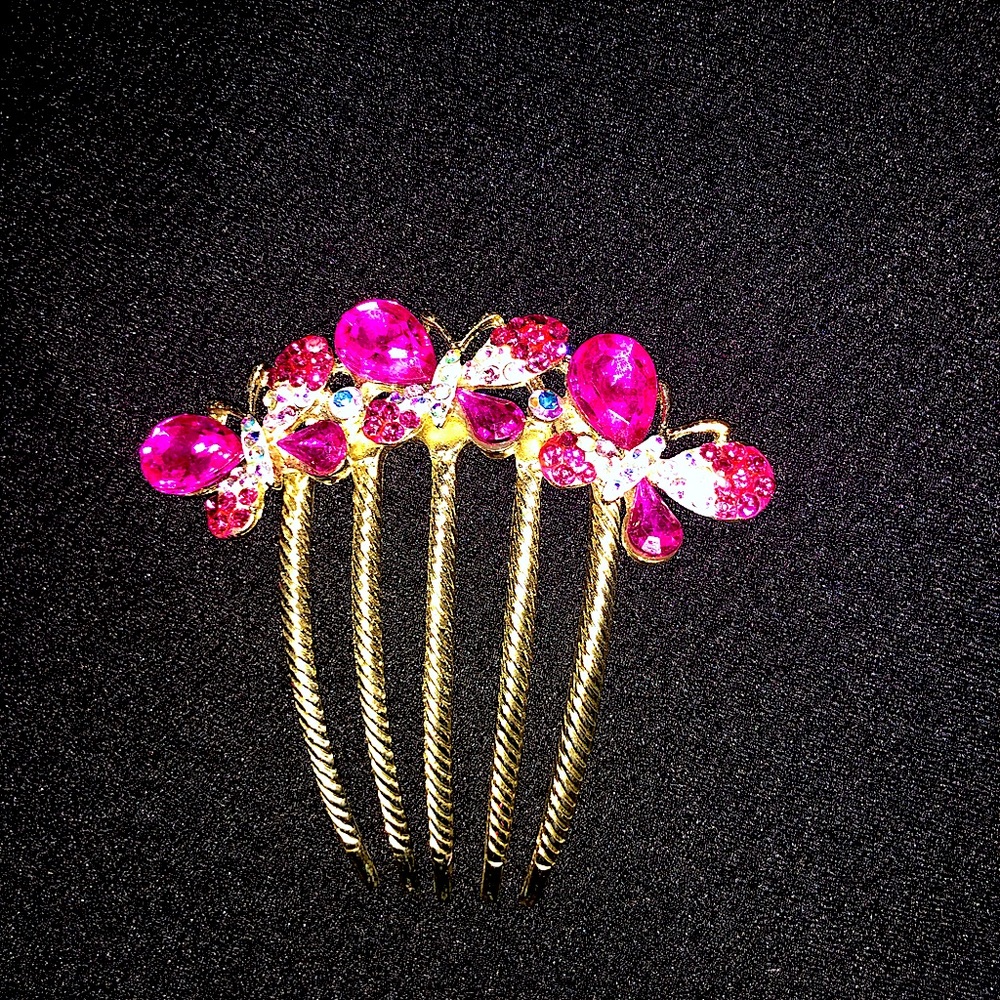 Vintage gold tone hair comb with hot pink rhinestones